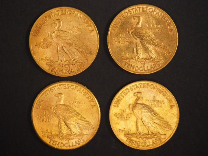 Quatre pièces de 10 Dollars or, 1910, 1911 (x2), 1913. FRAIS ACHETEURS