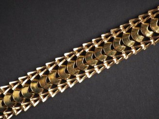 Vente aux enchères Bracelet articulé en or jaune.  Long. 20 cm Poids. 42,14 g