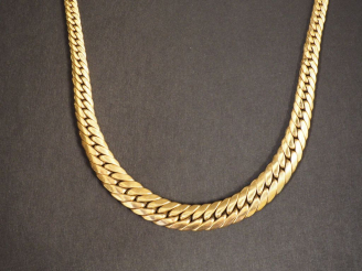 Vente aux enchères Collier articulé en or jaune, maille anglaise.  Long. 45 cm Poids. 19,