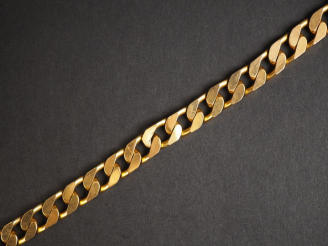 Vente aux enchères Gourmette en or jaune.  Long. 17,3 cm Poids. 43,97 g