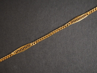 Vente aux enchères Giletière en or jaune. Long. 35 cm Poids. 11,83 g