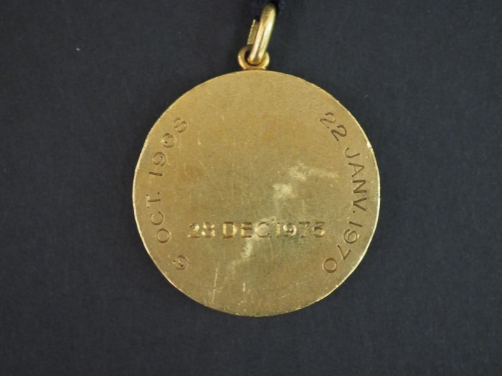 Médaille en or. Poids : 32,70 g
