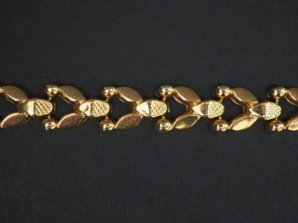 Vente aux enchères Bracelet en or maillons articulés. Poids : 11,80 g