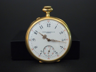 Vente aux enchères PATEK PHILIPPE. Montre de gousset en or (bélière accidentée) Poids tel