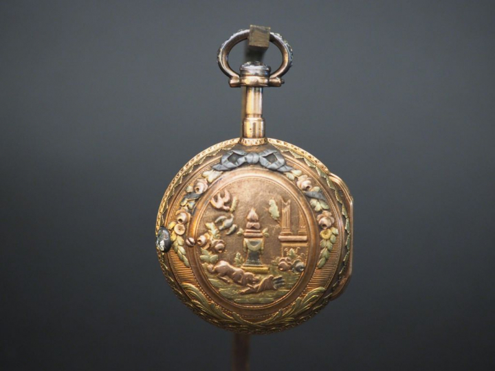 GRIEBEL. Montre Louis XVI en or et diamants taillés en roses (remontoi