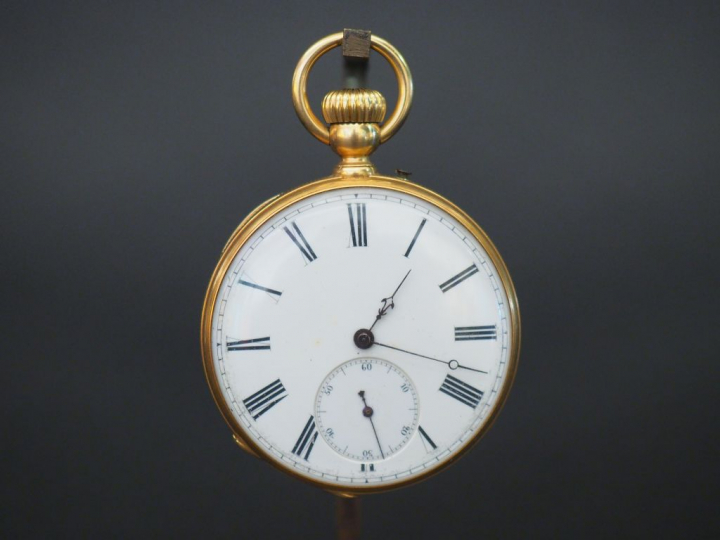 Montre de gousset en or.  Poids tel : 87 g