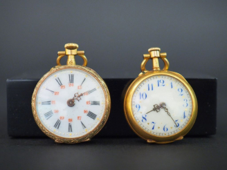 Vente aux enchères 2 montres de col en or. Poids tel : 28 g