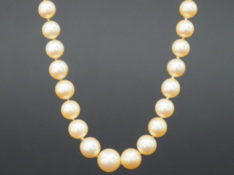 Vente aux enchères Collier de perles de culture.