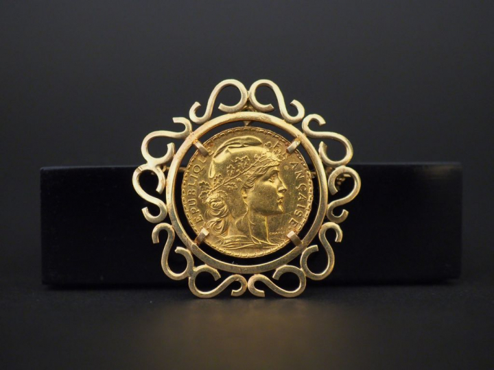 1 pièce de 20 francs montée. Poids : 12.60 g