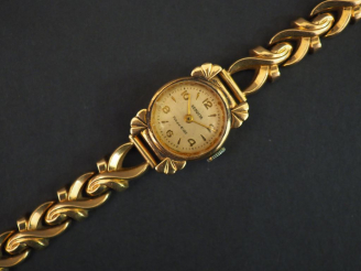 Vente aux enchères KODY modèle SEDUCTA. Montre de dame, boitier et bracelet or. Poids tel