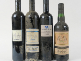 Vente aux enchères 4 BOUTEILLES MAURY MAS AMIEL : 1 de 1986 - 1 de 1993 - 1 de 1995 - 1 d