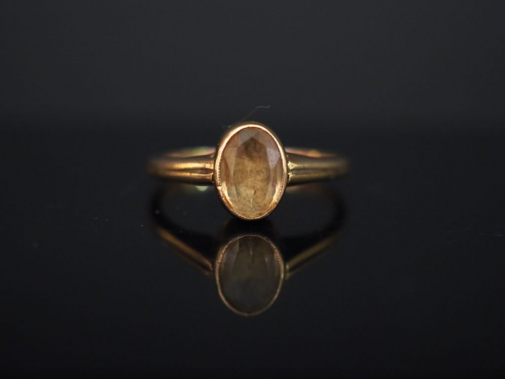 Bague en or et topaze. Poids tel : 2,08 g