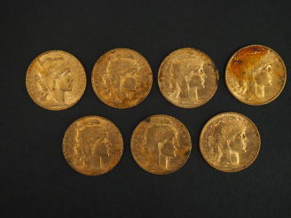 Vente aux enchères Sept pièces de 20 francs or, 1906. FRAIS ACHETEURS 5% TTC.