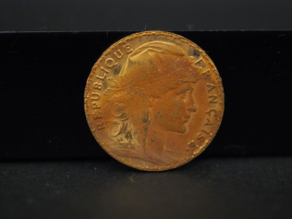 Vente aux enchères Une pièce de 20 francs or, 1910. FRAIS ACHETEURS 5% TTC.