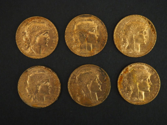 Vente aux enchères 	Six pièces de 20 francs or, 1912. FRAIS ACHETEURS 5% TTC.