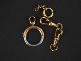 Vente aux enchères Eléments de giletière en or jaune. Poids. 9,43 g