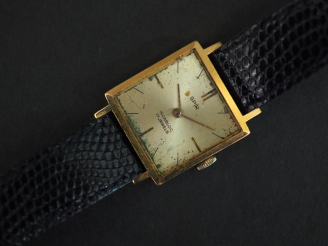 Vente aux enchères 	SPIR Montre bracelet, boitier en or jaune. Cadran carré à index bâton