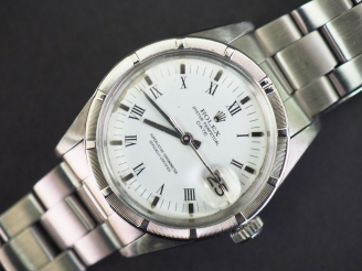 Vente aux enchères ROLEX Perpetual Date  Montre bracelet d’homme en acier.  Cadran blanc 