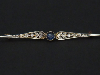 Vente aux enchères Broche barrette de style 1900 en or jaune, à décor de branchage, serti