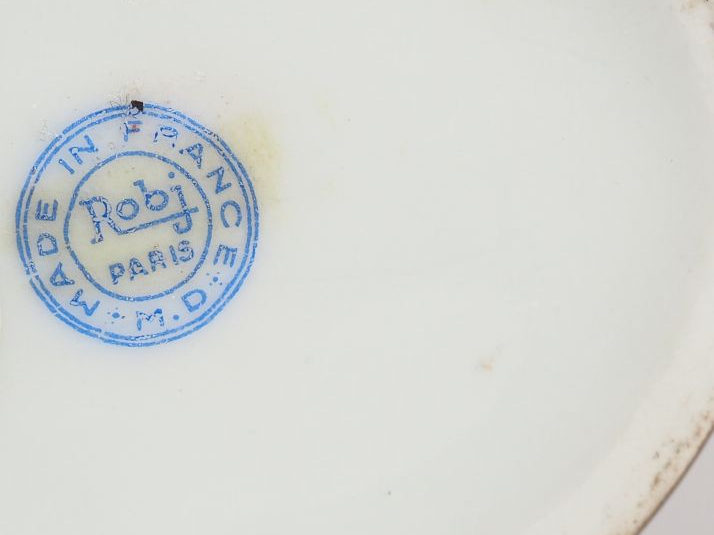 ROBJ.  Bouteille à liqueur en porcelaine polychrome "Jeune moine". Sig