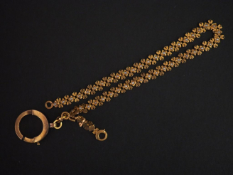 Vente aux enchères Giletière en or jaune, sertie de petites perles blanches.  Long. 22,5 