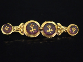 Vente aux enchères Broche barrette Napoléon III en or jaune, sertie de quatre améthystes 
