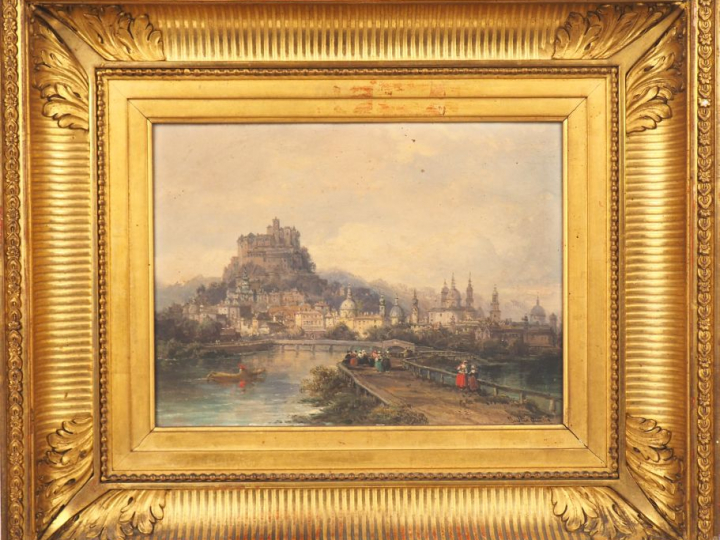 Justin OUVRIE "Vue de ville animée". Huile sur panneau, signée en bas 