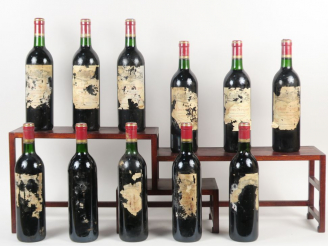 Vente aux enchères 11 BOUTEILLES CHÂTEAU CALON SEGUR GCC ST ESTEPHE - 1990 - BG/ETA/1 SE