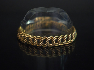Vente aux enchères Bracelet articulé en or jaune, maille gourmette.  Long. 20 cm Poids. 4