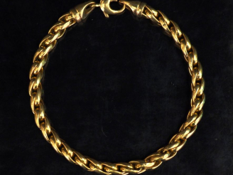 Vente aux enchères Bracelet souple en or jaune, maille ronde tressée. Long. 21,5 cm Poids