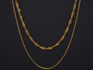 Vente aux enchères Ensemble comprenant :  - une chaine en or jaune, maille forçat.  Long.