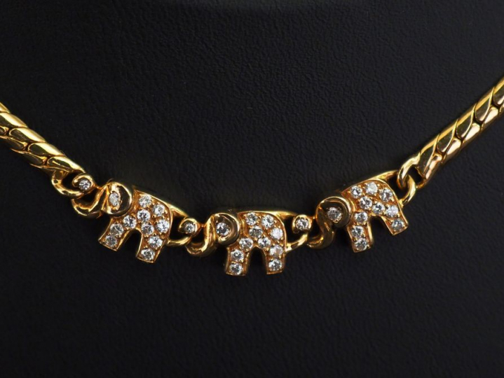 FRED, Paris Collier souple en or jaune, maille plate, agrémenté de tro
