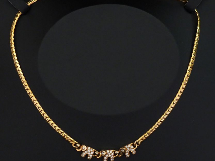 FRED, Paris Collier souple en or jaune, maille plate, agrémenté de tro