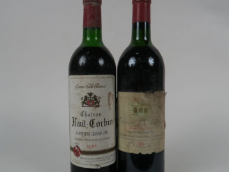 Vente aux enchères 2 BOUTEILLES : 1 CHÂTEAU HAUT CORBIN GCC SAINT EMILION 1985 HEP/EA/ELS