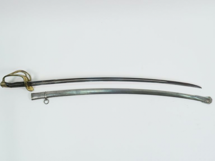 Sabre d’officier de cavalerie type 1822 d’achat privé. Monture en bron