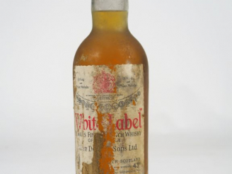 Vente aux enchères 1 BOUTEILLE SCOTCH WHISKY WHITE LABEL DEWAR’S 43° - ETA