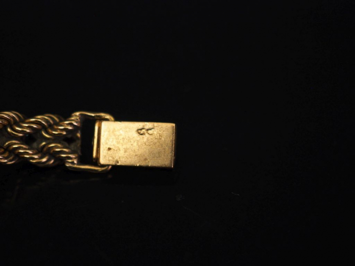 Montre de dame 1940, bracelet et boîtier en or, le cadran agrémenté de