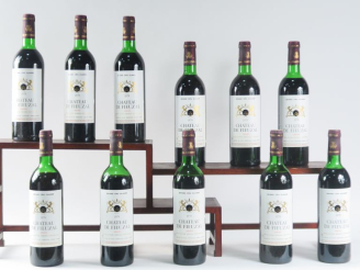 Vente aux enchères 11 BOUTEILLES CHÂTEAU FIEUZAL GCC GRAVES - 1979 - CBO - 5 BAS GOULOT D