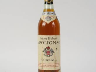 Vente aux enchères 1 BOUTEILLE COGNAC PRINCE HUBERT DE POLIGNAC - PAPIER DE SOIE