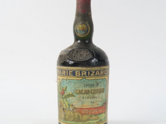 Vente aux enchères 1 VIEILLE BOUTEILLE CREME DE CACAO CHOUAO A LA VANILE MARIE BRIZARD - 