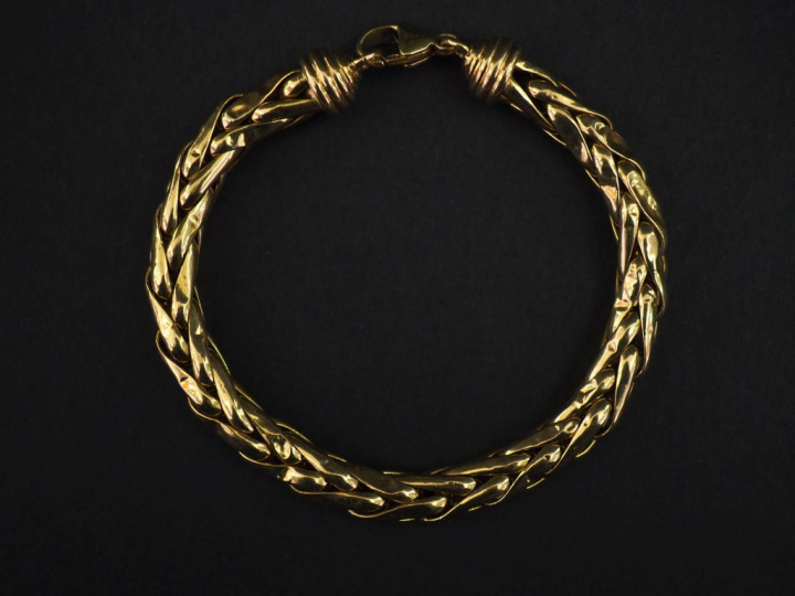 Bracelet articulé en or jaune 750, maille palmier.  Long. 19,5 cm Poid