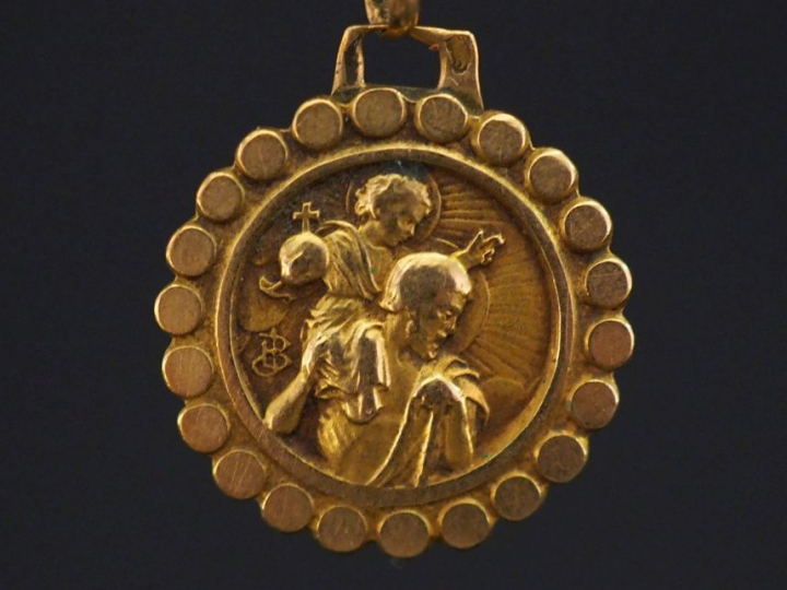 Médaille religieuse en or jaune 750, figurant Saint Christophe portant