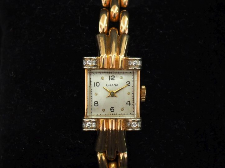 GRANA Montre bracelet de dame, boitier et bracelet en or jaune 750. Bo