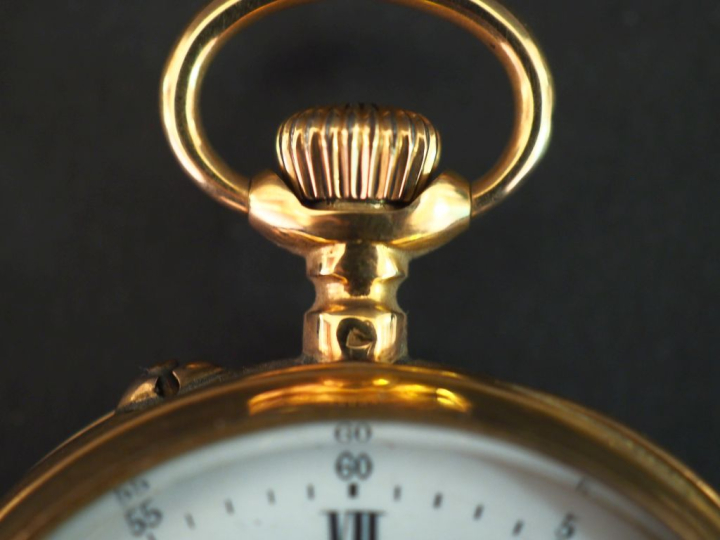 Montre de gousset en or jaune 750.  Cadran émaillé à chiffres romains 