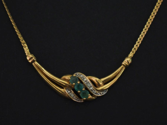 Vente aux enchères Collier souple en or jaune 750, maille plate gourmette, orné en son ce