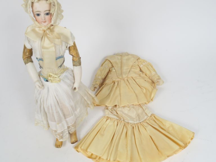 Poupée dite parisienne tête porcelaine de marque Gautier marquée 2, la