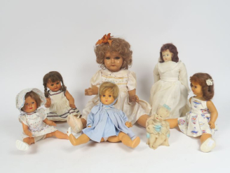 Vente aux enchères 	Lot de poupées et jouets des années 50 comprenant Parisette Petitcoll