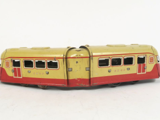 Vente aux enchères 	Petit autorail JEP mécanique en tôle lithographiée bel état d'usage e