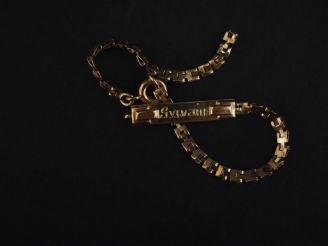 Vente aux enchères Bracelet de naissance en or jaune 750, marqué "Sylvain". Long. 13,5 cm