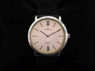 Vente aux enchères OMEGA, Constellation Montre bracelet d'homme en acier.  cadran rond à 